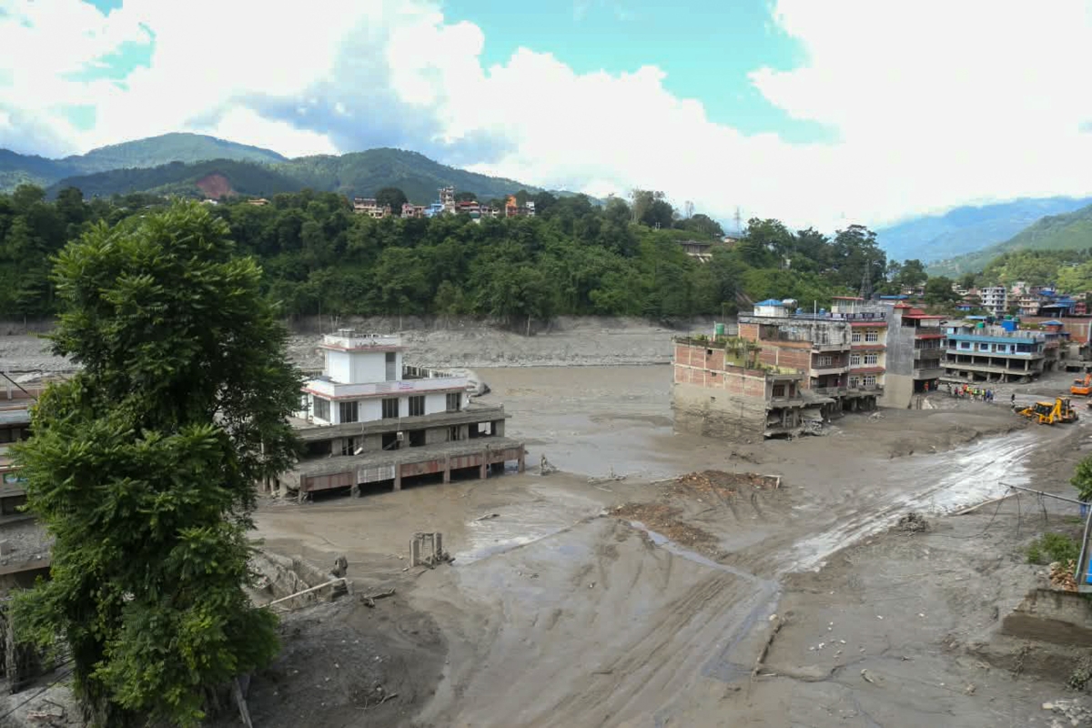 Flooding in Nepal - buildings and roads damaged by muddy floodwater